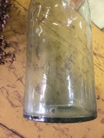 Oude fles in groen