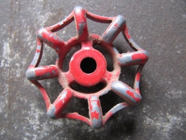 Old metal faucet handle red