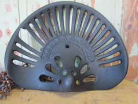 Cast iron tractor saddle