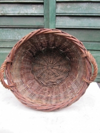 Cute old cane harvesting and wood baskets.