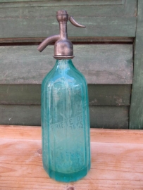 Old  green seltzer bottle with inscription