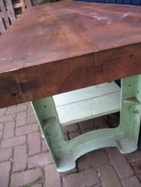 Very old cast iron machine frame with leaf