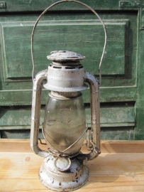 Old oil lamp white / brown / reddish.