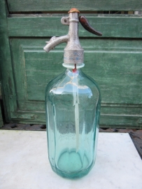 Flea green seltzer bottle with facets