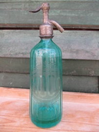 Old  green seltzer bottle with inscription
