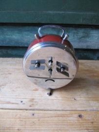 Old alarm clock with red border