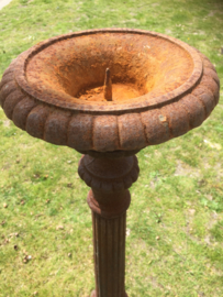 Old high cast iron candlestick
