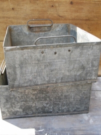 Old galvanized rectangular container with two handles on the inside