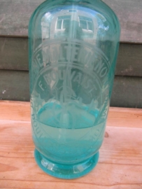 Old  green seltzer bottle with inscription