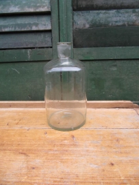 Brocante bottle in clear glass.