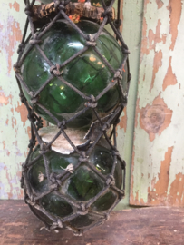 Antique French glass floats in net