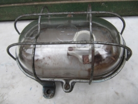 Old industrial metal cage lamp