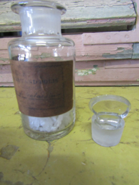 Antique French bottle with label