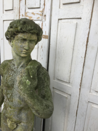 Old concrete statue very beautiful patiné