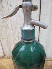 Dark green facet seltzer bottle