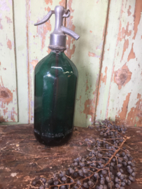 Old seltzer bottle, facet, dark green