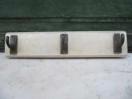 Old hanger with 3 beautiful metal brackets