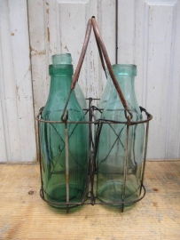 Antique basket for carrying 4 bottles.