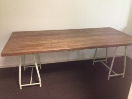 Large work table with metal frame and thick sheet