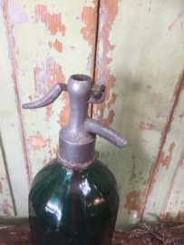 Old seltzer bottle, facet, dark green