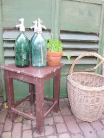 Old wooden brown farmer stool