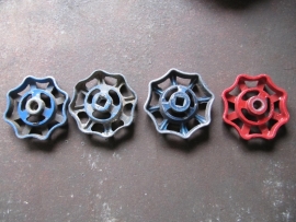 Old metal faucet handle blue or red