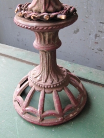 Beautiful old red metal candlestick