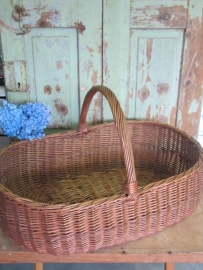 Large wicker basket with handle