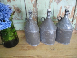 Old galvanized water bottles