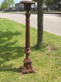 Old high cast iron candlestick