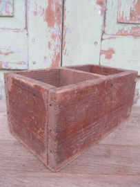 Two-compartment wooden box.