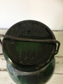 Old large bottle with lid