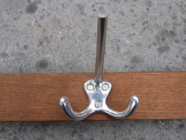 Coat rack with 3 hooks.