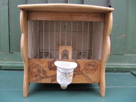 Antique bird cage with beautiful little water bowl