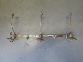 Old metal coat rack  5 hooks
