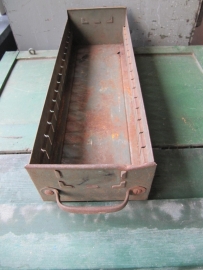 Old dark metal tray or drawer