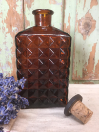 Oude Spaanse fles met motief