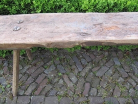 Old natural colour wooden bench.