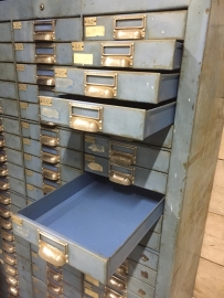 Old industrial metal drawer chest