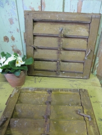 Old set small shutters in ocher yellow
