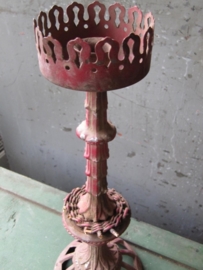Beautiful old red metal candlestick