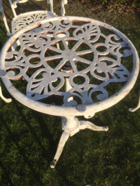 Brocante table with four chairs