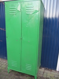 Old heavy duty green metal factory locker