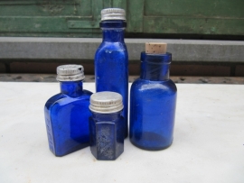 Antique French blue triangular bottle