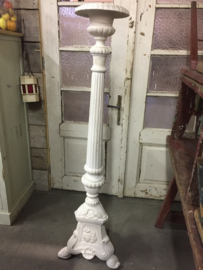 Old high cast iron candlestick