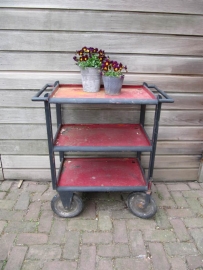 French heavy metal vintage serving trolley on big wheels