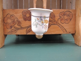 Antique bird cage with beautiful little water bowl