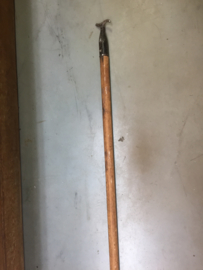 Oude stok met raam-opener