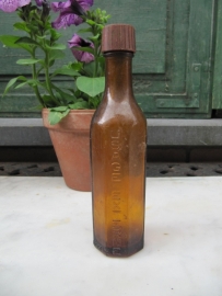 French old brown medicine bottle of E & J Gravis 155ml.