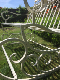 Old metal swing bench